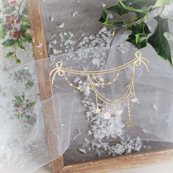 decorative laser cut chipboard garland with stars hearts and baubles