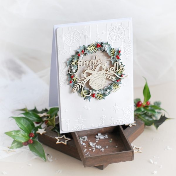 handmade christmas card with jingle bells wreath