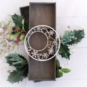 decorative laser cut chipboard frame with swirls and snowflakes