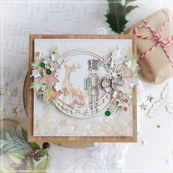 handmade christmas card with nutcracker and laser cut chipboard frame embellishment