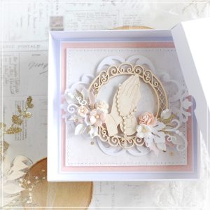 personalised handmade first holy communion card for a girl decorated with praying hands